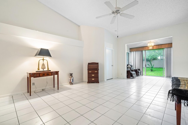 9165 Vineland Ct Unit B, Boca Raton, FL 33496 - living area featuring a ceiling fan, light tile patterned floors, high vaulted ceiling, and a textured ceiling
