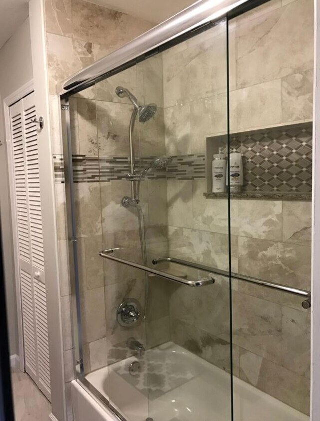 3313 Sherwood Blvd, Delray Beach, FL 33445 - bathroom featuring combined bath / shower with glass door