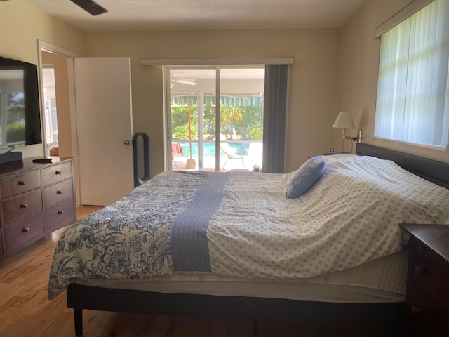 3313 Sherwood Blvd, Delray Beach, FL 33445 - bedroom with access to outside and light wood finished floors