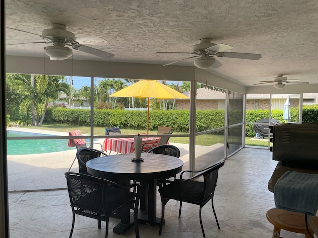 3313 Sherwood Blvd, Delray Beach, FL 33445 - sunroom featuring ceiling fan and outdoor dining area