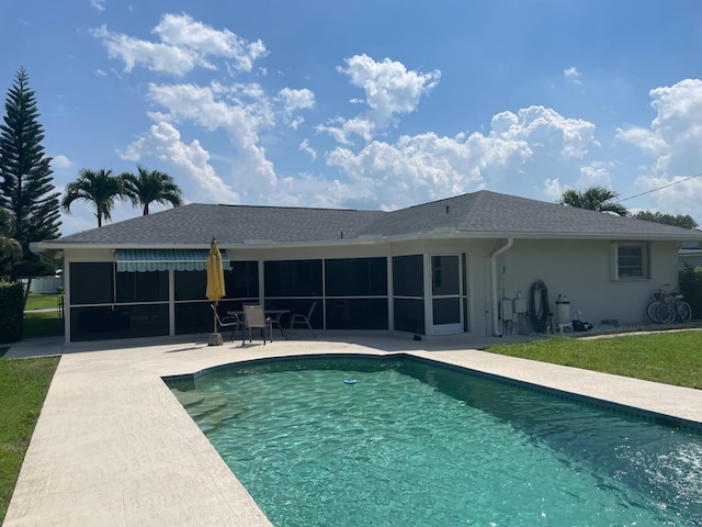3313 Sherwood Blvd, Delray Beach, FL 33445 - swimming pool featuring a sunroom and a patio