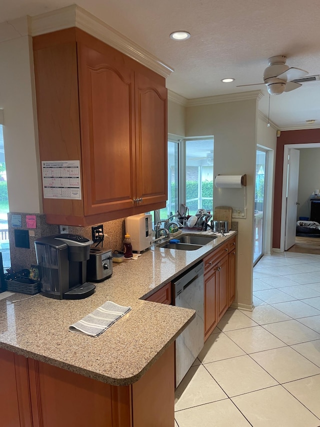 3313 Sherwood Blvd, Delray Beach, FL 33445 - kitchen with stainless steel dishwasher, ornamental molding, a ceiling fan, backsplash, and a sink