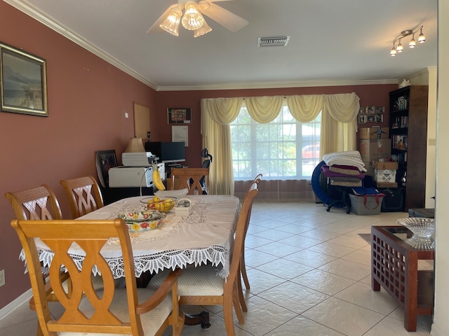 3313 Sherwood Blvd, Delray Beach, FL 33445 - dining area featuring a ceiling fan, crown molding, and light tile patterned floors