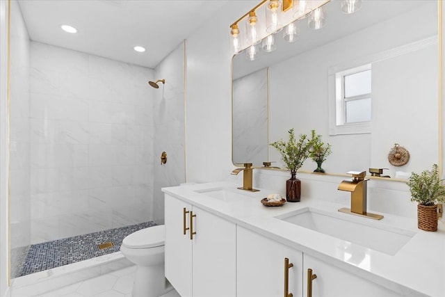 533 Riverside Dr, Palm Beach Gardens, FL 33410 - full bath with double vanity, tiled shower, and recessed lighting