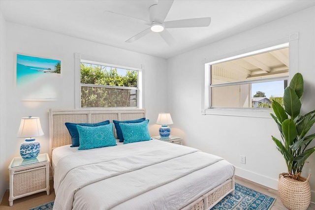 533 Riverside Dr, Palm Beach Gardens, FL 33410 - bedroom featuring wood finished floors and ceiling fan