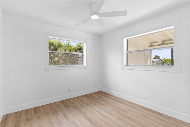 533 Riverside Dr, Palm Beach Gardens, FL 33410 - empty room featuring wood finished floors and ceiling fan