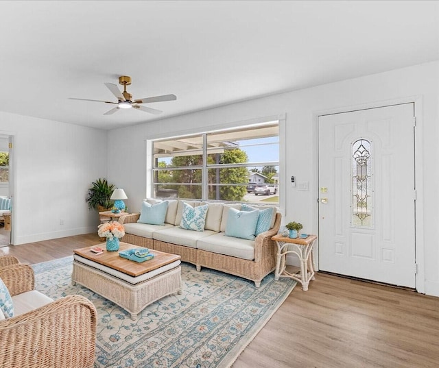 533 Riverside Dr, Palm Beach Gardens, FL 33410 - living area featuring light wood finished floors and ceiling fan