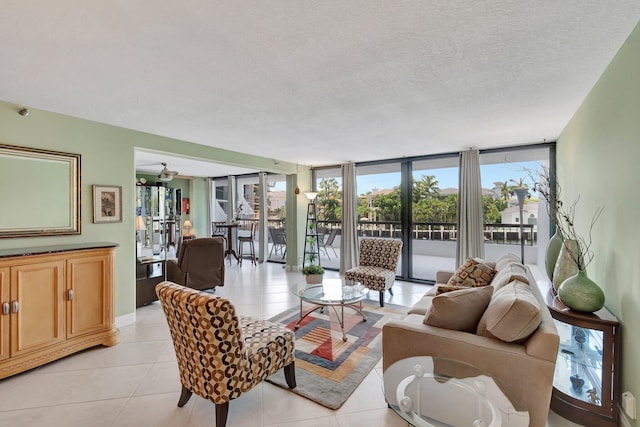 4740 S Ocean Blvd Unit 202, Highland Beach, FL 33487 - living area with light tile patterned floors and a textured ceiling