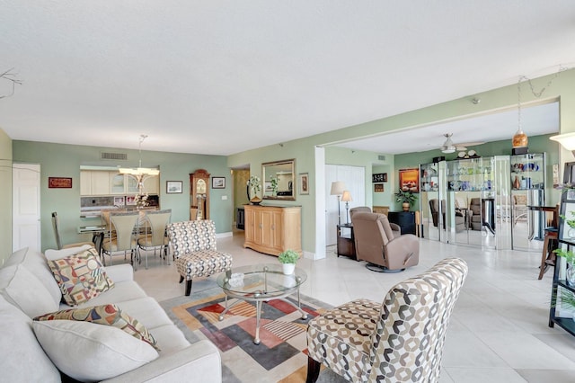 4740 S Ocean Blvd Unit 202, Highland Beach, FL 33487 - living room featuring a chandelier and light tile patterned flooring