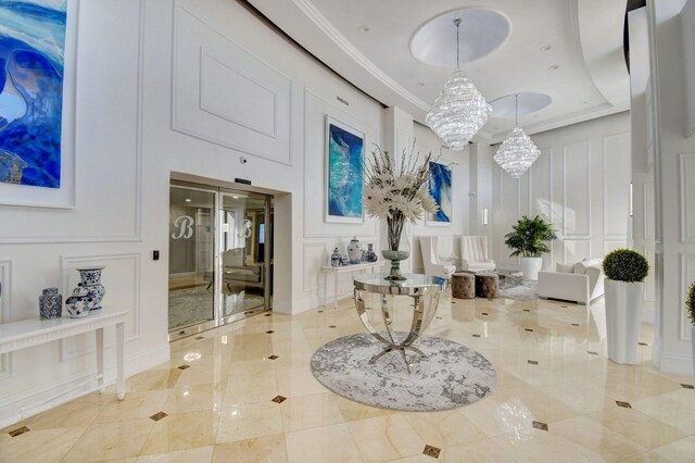 4740 S Ocean Blvd Unit 202, Highland Beach, FL 33487 - building lobby featuring a decorative wall and ornamental molding