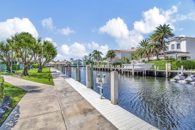 4740 S Ocean Blvd Unit 202, Highland Beach, FL 33487 - dock area with a water view and boat lift