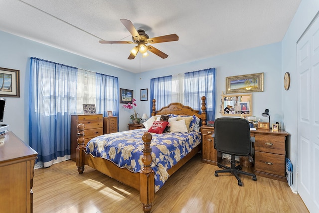 2161 NE 1st Ct Unit 101, Boynton Beach, FL 33435 - bedroom featuring light wood-style floors and ceiling fan