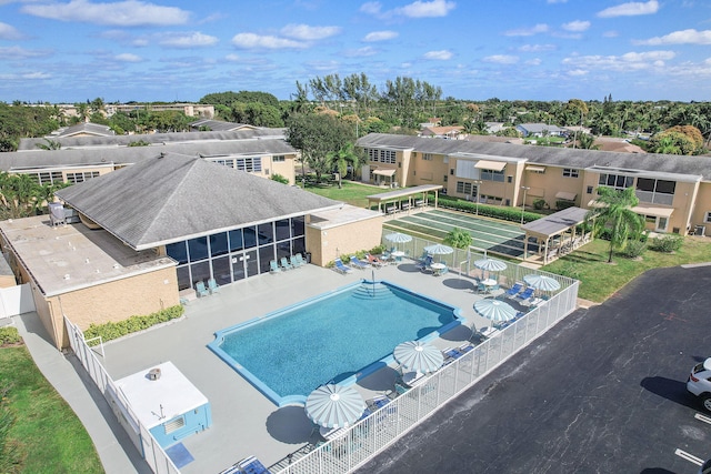 2161 NE 1st Ct Unit 101, Boynton Beach, FL 33435 - community pool featuring a fenced backyard and a patio
