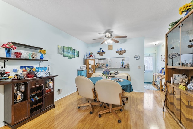 2161 NE 1st Ct Unit 101, Boynton Beach, FL 33435 - dining room featuring light wood-style flooring, ceiling fan, baseboards, and an office area