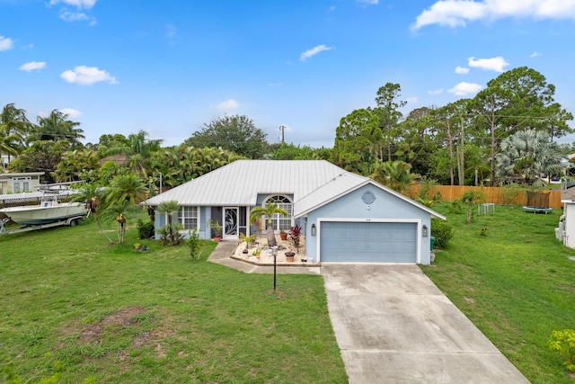 504 SW Pea Ct, Port Saint Lucie, FL 34953 - ranch-style house with concrete driveway and an attached garage