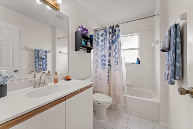 504 SW Pea Ct, Port Saint Lucie, FL 34953 - full bathroom with tile patterned floors, vanity, toilet, shower / bathtub combination with curtain, and a textured ceiling