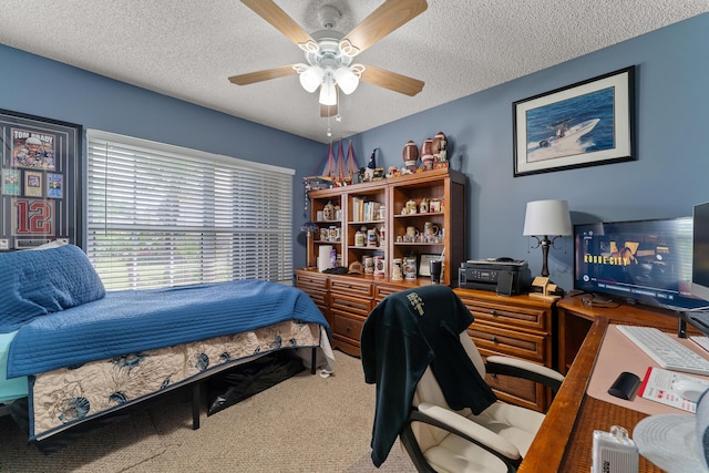 504 SW Pea Ct, Port Saint Lucie, FL 34953 - carpeted bedroom with a textured ceiling, a desk, and ceiling fan