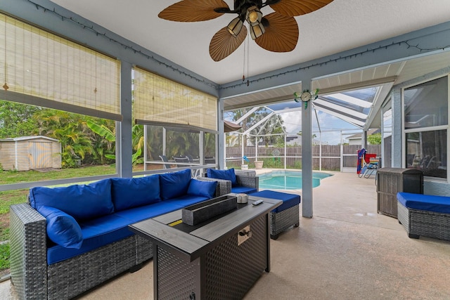 504 SW Pea Ct, Port Saint Lucie, FL 34953 - fenced backyard with an outdoor living space, a patio, ceiling fan, and a lanai