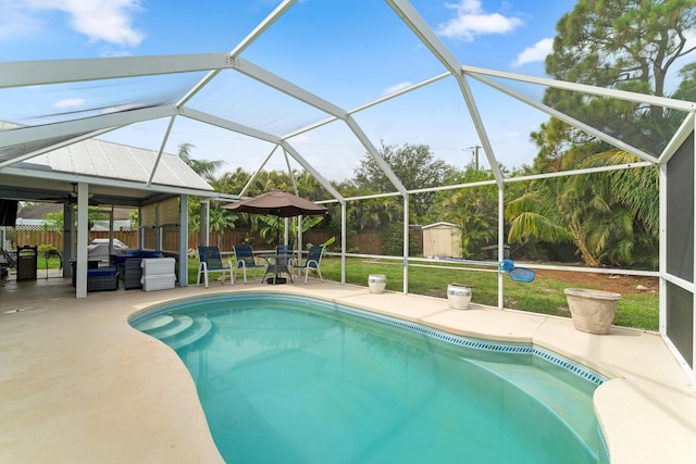 504 SW Pea Ct, Port Saint Lucie, FL 34953 - view of pool featuring a patio area and glass enclosure