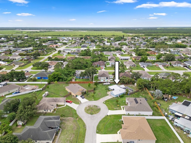504 SW Pea Ct, Port Saint Lucie, FL 34953 - aerial overview of property's location with nearby suburban area