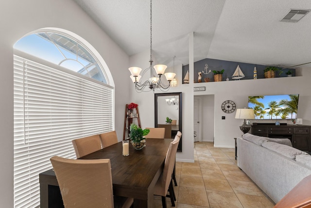 504 SW Pea Ct, Port Saint Lucie, FL 34953 - dining space with a chandelier, vaulted ceiling, a textured ceiling, and baseboards