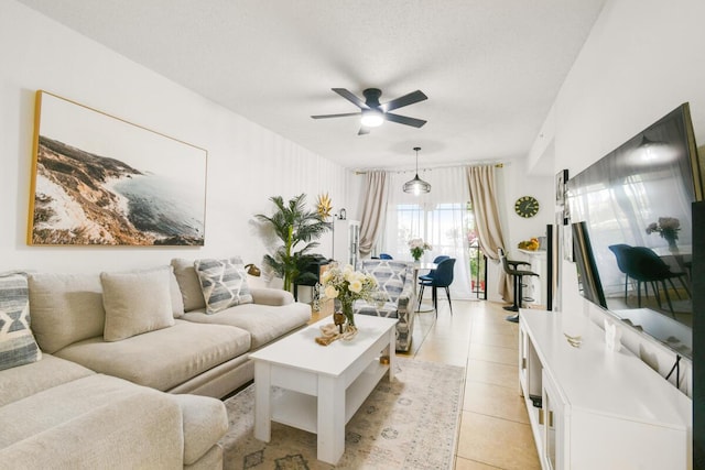 2916 Tuscany Ct Unit 104, Palm Beach Gardens, FL 33410 - living room featuring a ceiling fan and light tile patterned floors