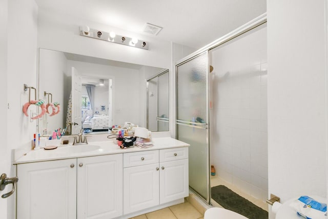 2916 Tuscany Ct Unit 104, Palm Beach Gardens, FL 33410 - bathroom with a shower stall, connected bathroom, vanity, toilet, and tile patterned flooring