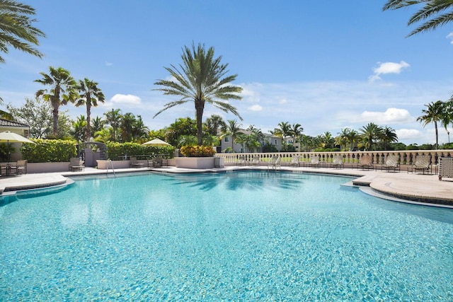 2916 Tuscany Ct Unit 104, Palm Beach Gardens, FL 33410 - community pool featuring a patio area