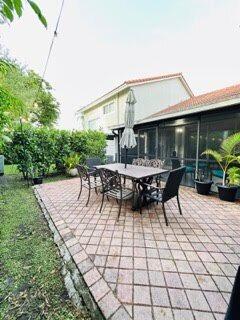 7624 Pinewalk Dr S Unit 147, Margate, FL 33063 - view of patio / terrace with outdoor dining area