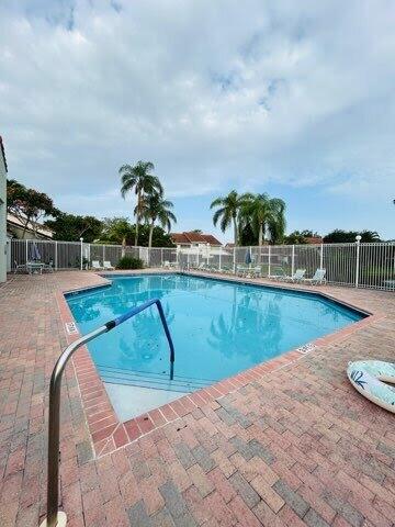 7624 Pinewalk Dr S Unit 147, Margate, FL 33063 - community pool with a patio area