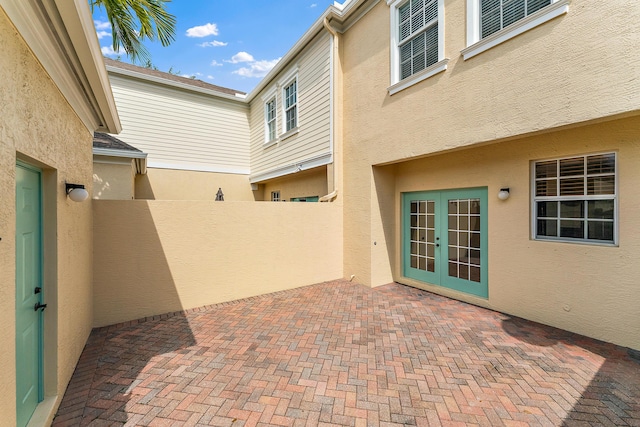 128 W Thatch Palm Cir, Jupiter, FL 33458 - view of patio / terrace with french doors