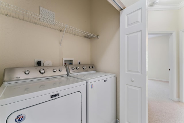 128 W Thatch Palm Cir, Jupiter, FL 33458 - washroom featuring separate washer and dryer and light colored carpet