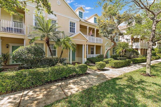 128 W Thatch Palm Cir, Jupiter, FL 33458 - townhome / multi-family property featuring stucco siding