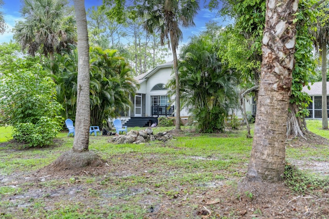 17069 81st Ln N, Loxahatchee, FL 33470 - view of yard featuring a deck