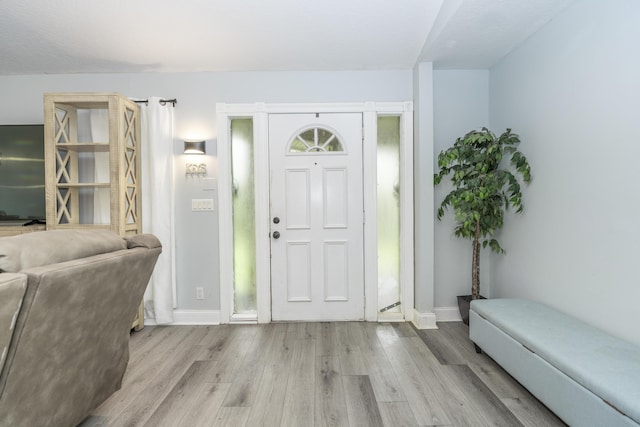 17069 81st Ln N, Loxahatchee, FL 33470 - entryway with wood finished floors and baseboards