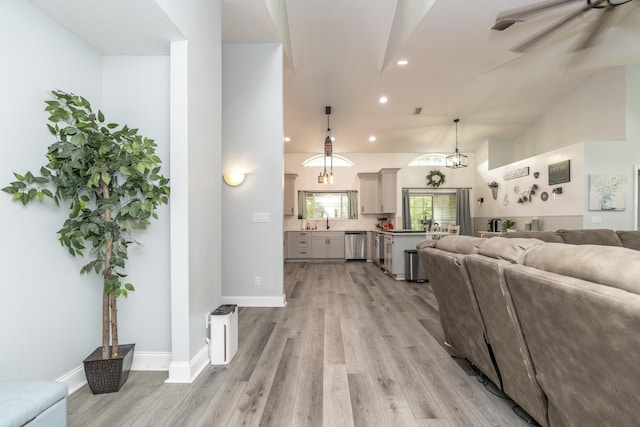 17069 81st Ln N, Loxahatchee, FL 33470 - living area featuring recessed lighting, light wood-type flooring, ceiling fan, and baseboards