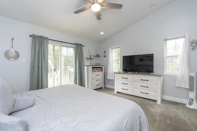 17069 81st Ln N, Loxahatchee, FL 33470 - bedroom featuring lofted ceiling, light carpet, multiple windows, and baseboards