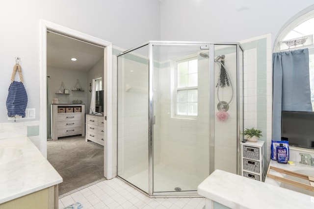 17069 81st Ln N, Loxahatchee, FL 33470 - bathroom featuring vanity, a stall shower, and tile patterned floors