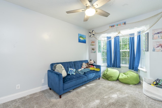 17069 81st Ln N, Loxahatchee, FL 33470 - living room featuring carpet floors, ceiling fan, and baseboards