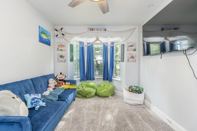 17069 81st Ln N, Loxahatchee, FL 33470 - carpeted living area featuring a ceiling fan and baseboards
