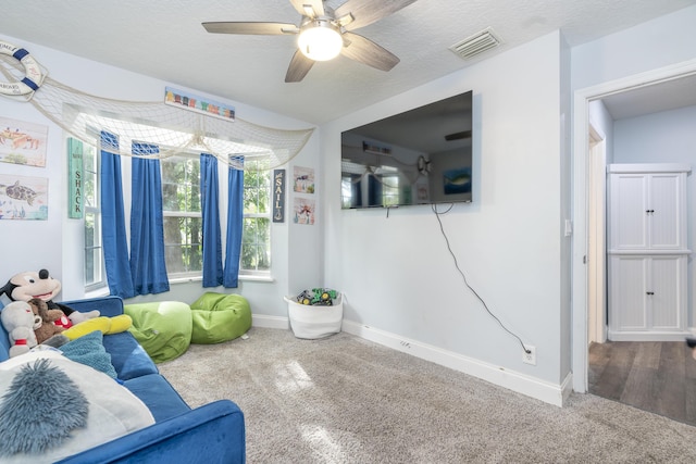 17069 81st Ln N, Loxahatchee, FL 33470 - carpeted living room featuring ceiling fan and baseboards