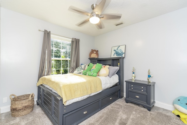 17069 81st Ln N, Loxahatchee, FL 33470 - bedroom with light carpet, baseboards, and ceiling fan