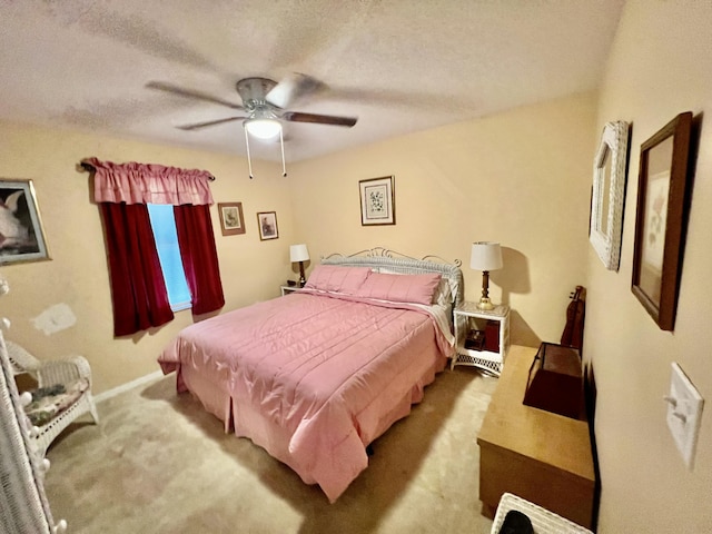 125 Capri Ave, Sebastian, FL 32958 - bedroom with carpet, a textured ceiling, ceiling fan, and baseboards