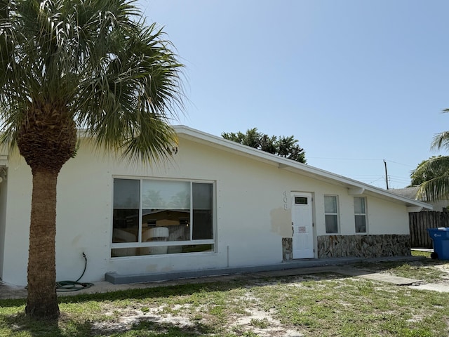 408 S 9th St, Lantana, FL 33462 - view of home's exterior with stucco siding and stone siding