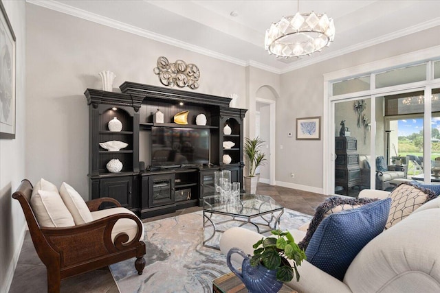 9926 SW Nuova Way, Port Saint Lucie, FL 34986 - living room with baseboards, arched walkways, a chandelier, and ornamental molding