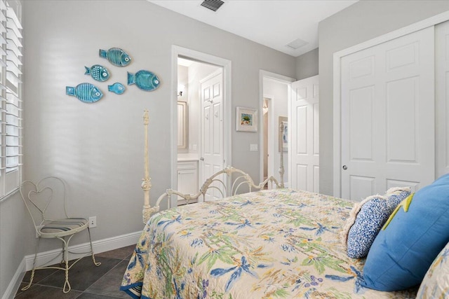 9926 SW Nuova Way, Port Saint Lucie, FL 34986 - bedroom with baseboards and a closet