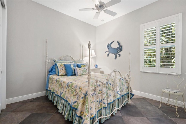 9926 SW Nuova Way, Port Saint Lucie, FL 34986 - bedroom featuring baseboards and a ceiling fan