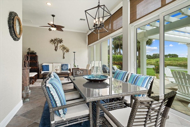 9926 SW Nuova Way, Port Saint Lucie, FL 34986 - sunroom with plenty of natural light and a chandelier