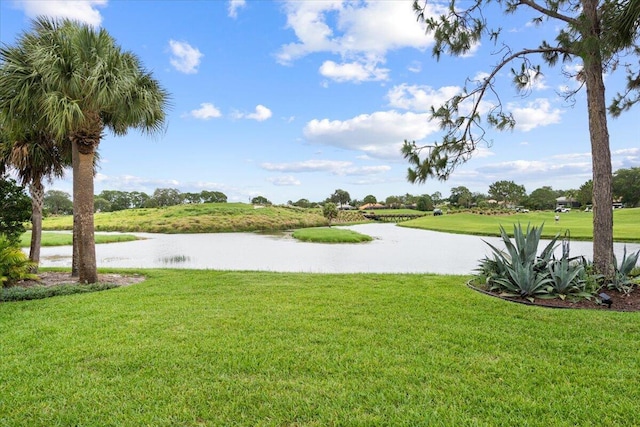 9926 SW Nuova Way, Port Saint Lucie, FL 34986 - view of grassy yard featuring a water view