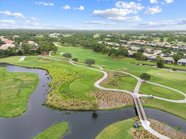 9926 SW Nuova Way, Port Saint Lucie, FL 34986 - aerial perspective of suburban area with a golf course and a nearby body of water